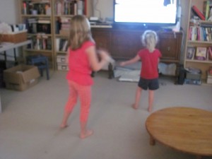 My girls shaking it to Smurfs Dance Party!